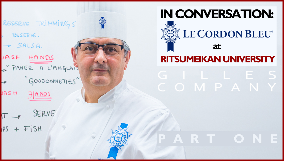 Le Cordon Bleu Japan at Ritsumeikan University - Executive Chef and Culinary Academic Director, Gilles Company stands in front of a whiteboard in Chef whites