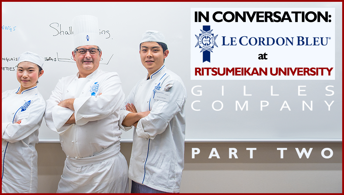 Le Cordon Bleu Japan’s Executive Chef and Culinary Academic Director, Gilles Company laughs with two students, all dressed in chef whites, in front of a whiteboard