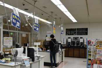 Plastic sheets have been hung in front of the registers to prevent the spread of droplets
