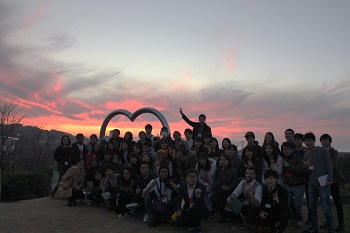 Group photo in front of the sunset