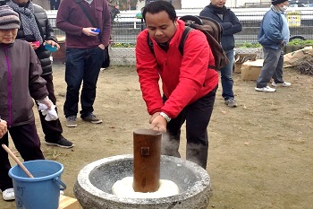 Pounding mochi at a festival