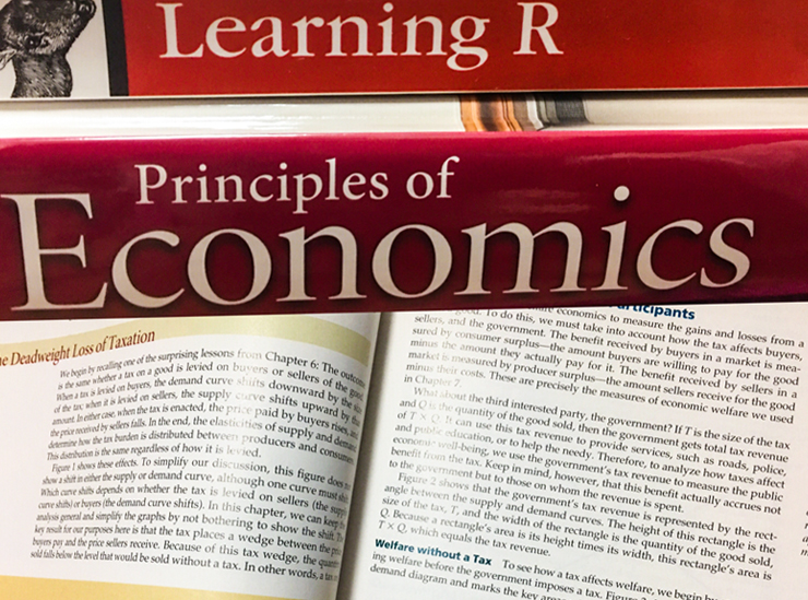 Photo of economics text book - Lucia has also found the study of economics from the perspective of policy science particularly enlightening
