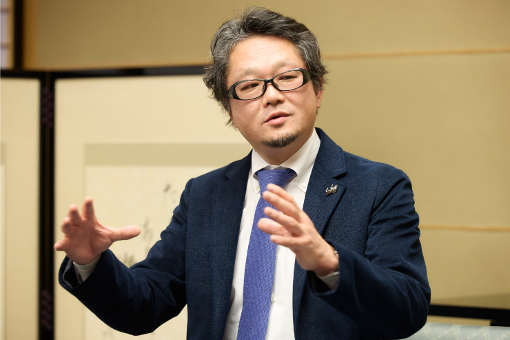 Professor Akio Tokuda talks enthusiastically about the project.