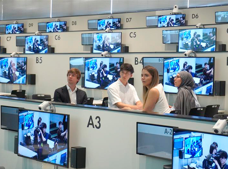 The group toured the remote education facilities and state-of-the-art equipment primarily housed in Building H, which was completed in April 2024.